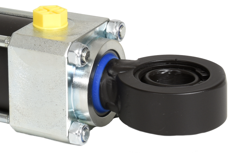 Hydraulcylinder KC med ledlager - detaljvy av kolvstång med svart gummimanschett och blå tätning